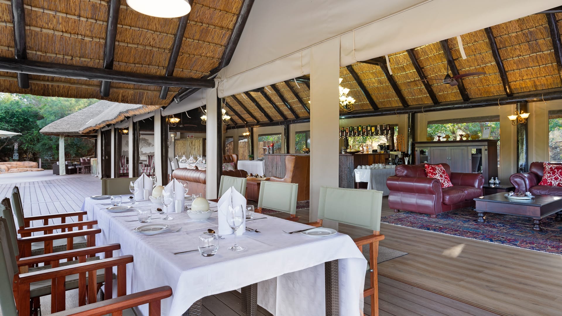 Executive Boardroom at Hippo Lakes, a 750 sq ft private working space with floor-to-ceiling windows looking into the bush